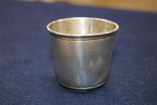 A French Cartier engine turned silver small beaker, 1.9 oz.